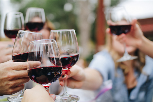 group of people sharing a wine tasting.