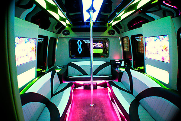 wide leather seating inside a party bus